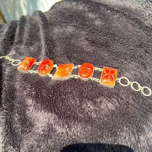 Sterling Silver Bracelet w/Carved Carnelian Stations